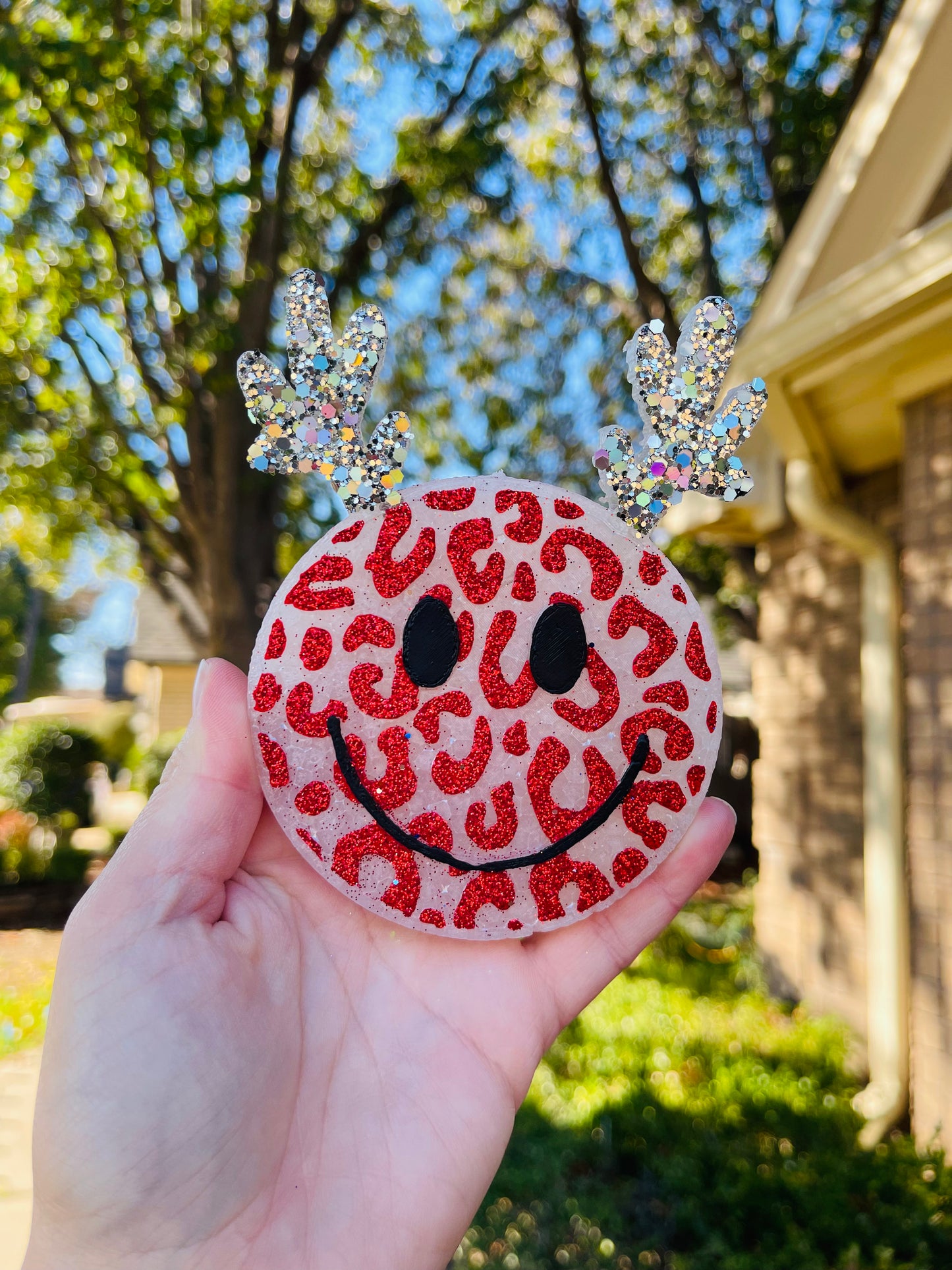 Leopard Smiley Reindeer with red glitter